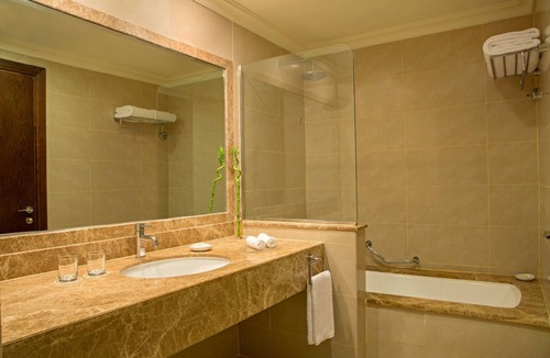 Al Aqah Hotel | Stay Right by the Beach w/Pool Access - Garden Views for Your Enjoyment