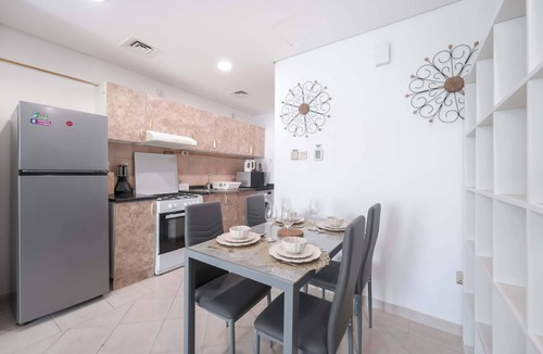 Dubai Production City Apartment | StayShort - Cozy & Quiet Studio in Production City for 3