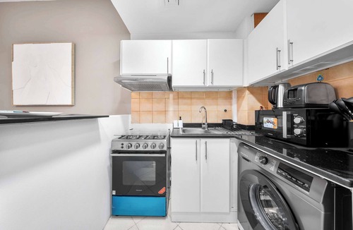 Dubai Production City Apartment | StayShort - Inviting Studio in Production City for 4