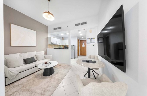 Dubai Production City Apartment | StayShort - Inviting Studio in Production City for 4