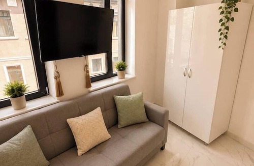 Bucharest Apartment | Stylish 1-Bedroom Apartment with Warm Accents