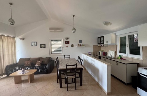 Blace Apartment | Stylish Family Retreat with Stunning Sea Views, Terrace & Steps to the Beach