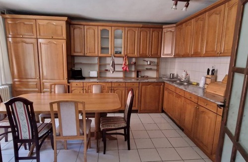Belgrade House | The beautiful, spacious villa in Vrčin features seven bedrooms and three bathrooms.