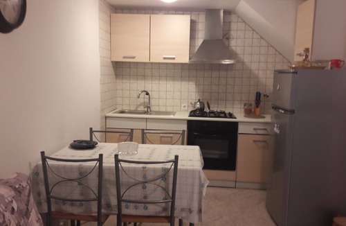 Unije House | This villa comes with a living room and a fully equipped kitchen.
