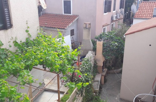 Unije House | This villa comes with a living room and a fully equipped kitchen.