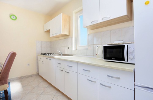 Arbanija Apartment | Three bedroom apartment with balcony and sea view Arbanija, Čiovo (A-18224-a)