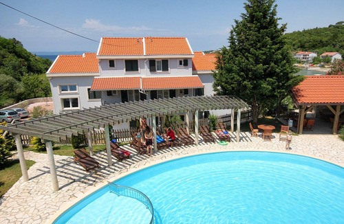 Kampor Apartment | Two bedroom apartment with a swimming pool by the beach Kampor, Rab (A-3213-b)
