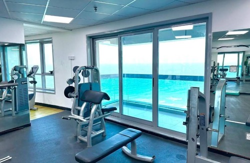 Rumailah Apartment | Two-bedroom hotel apartment with a living room and a sea view, VIP