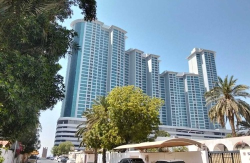 Rumailah Apartment | Two-bedroom hotel apartment with a living room and a sea view, VIP