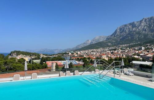 Dugis Apartment | Uzelac Apartment - Pool & Sea View in Makarska