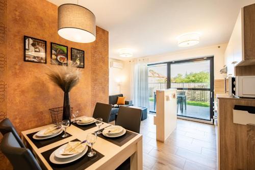 Apartmaji BANONIA " Sončni zahod " in Banovci