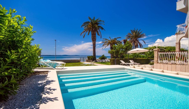 Beachfront Bliss: Villa Amor - A Luxurious 7 bedroom villa with a heated pool