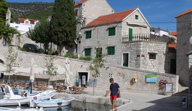 Bol. Seafront house, near beach with private parking space.