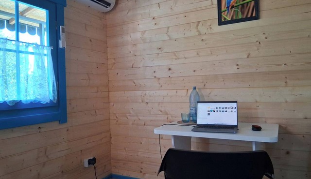Cozy 1-bedroom bungalow in tranquil Mila 23 with AC in Mila 23