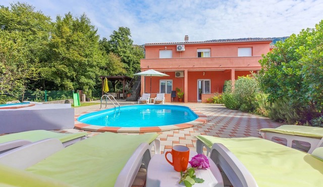 Dog-friendly holiday home with playground, private pool, table football, charcoal barbecue