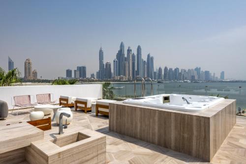 FIVE Palm Beachfront Villa -Private Pool & Jacuzzi, Panoramic Views, by Exclusive Holiday Homes in Dubai