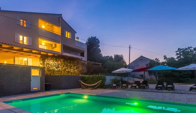 Holiday apartment NAYA with large heated pool (50m2) in Nerezine, beautiful beach with crystal-clear sea in Nerezine
