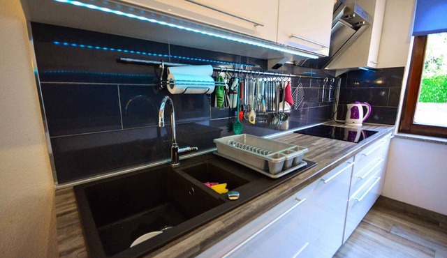 Holiday home with terrace and barbecue