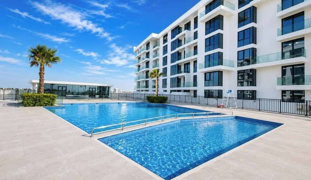 Lagoon View Apartment w/Pool, Beach & Gym Access in Ajmal Makan
