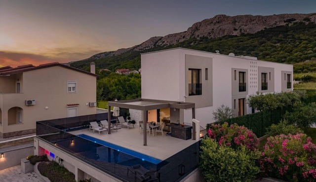 Modern villa with a private pool and sauna.