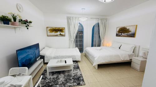 O07 Luxury Furnished Studio Apartment near bus stop Garden view Persia Cluster in Dubai