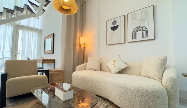 Oasis Grove: Stylish 2BR Retreat in Masdar City in Abu Dhabi