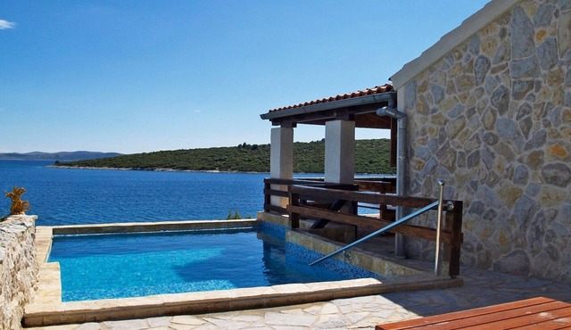 Seaside family friendly house with a swimming pool Cove Lađin - Lanđin, Pašman (K-20399) in Tkon
