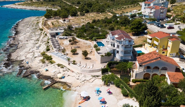 Two bedroom apartment with a swimming pool by the beach Zečevo Rtić, Rogoznica (A-8366-d)