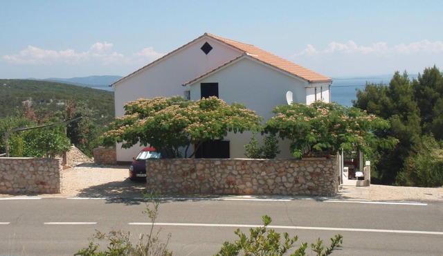 Two bedroom apartment with balcony and sea view Žman, Dugi otok (A-24325-a)