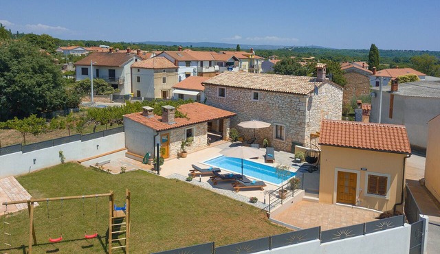 Villa Tonin for 6 people near Pula with jacuzzi & children playground in Marcana