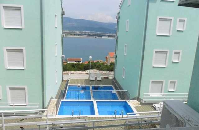 Holiday apartment with pool and sea view