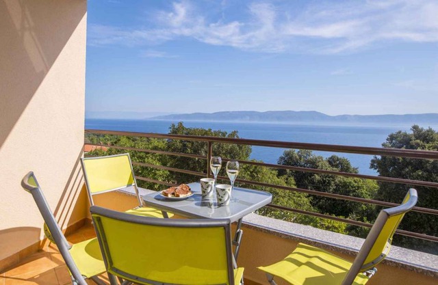 Holiday apartment with balcony and sea view