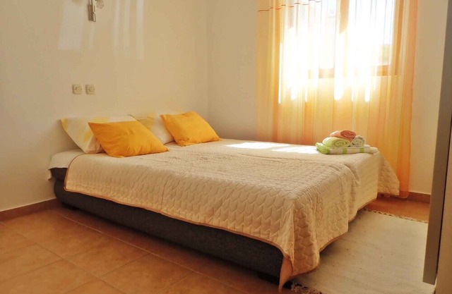 Holiday apartment with air conditioning and terrace with sea view