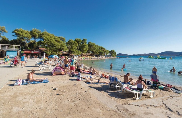 These comfortable and practically furnished apartments are located just 20 meters from the beach.