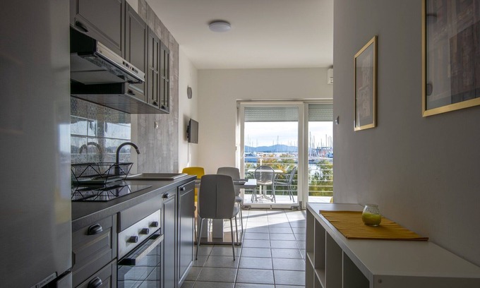 Municipality of Murter Apartment | Apartment with 2 bedrooms, terrace with sea view, right on the beach