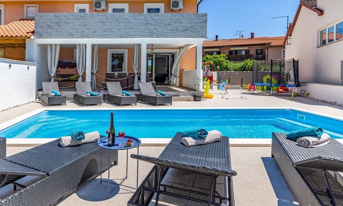 Marcana House | This attractive semi-detached house with pool is located in Mar.