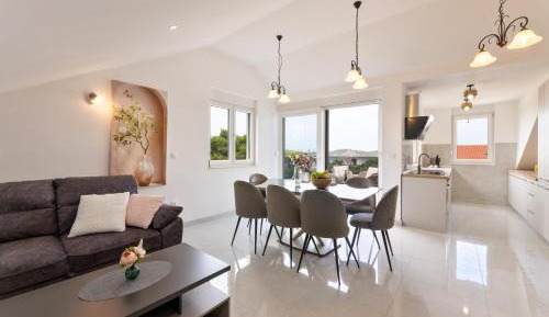 Three-Bedroom Apartment with Sea View