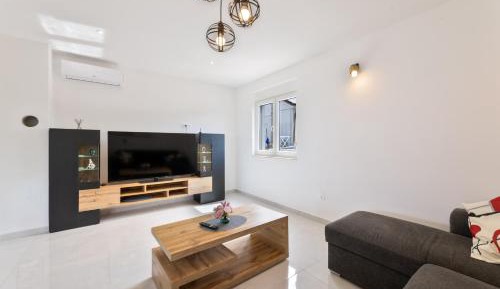 Three-Bedroom Apartment with Sea View