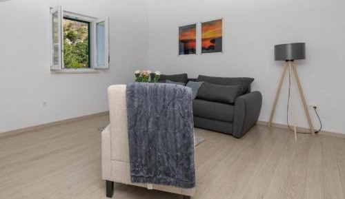 Two-Bedroom Apartment with Balcony and Sea View