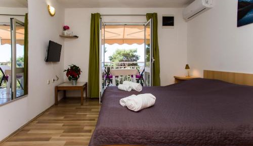 One-Bedroom Apartment with Balcony and Sea View