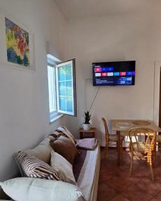 One-Bedroom Apartment with Balcony and Garden View