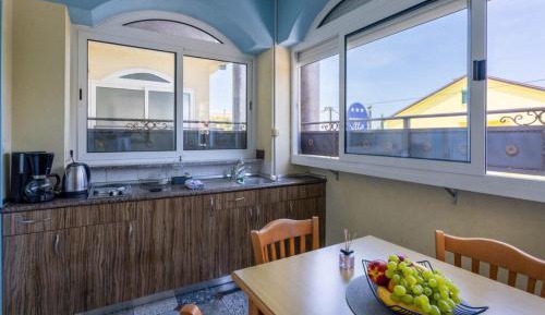 Four-Bedroom Apartment with Balcony 