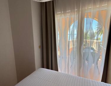 One-Bedroom Apartment with Balcony and Sea View