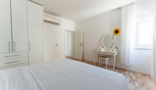 Three-Bedroom Apartment with Sea View