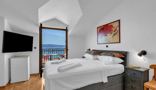 Quadruple Room with Balcony and Sea View