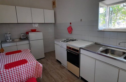 Postira Apartment | Two bedroom apartment with terrace and sea view Postira, Brač (A-21308-a)