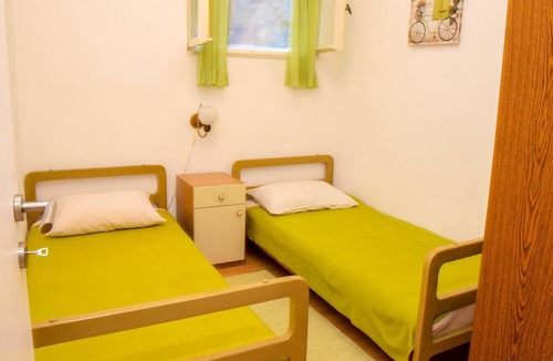 Postira Apartment | Two bedroom apartment with terrace and sea view Postira, Brač (A-21308-a)