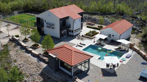 Lovrec Villa | Vila Agape with a pool, football and tennis court