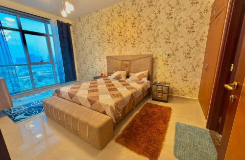 Rumailah Apartment | Beachfront Luxury Family Apartment with Pool, Gym, Jacuzzi - AJMAN Corniche UAE
