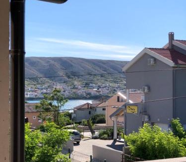 Pag House | Villa Dora - Mediterranean family house for 9 with private garden, BBQ, sea view and private parking for 4 cars
